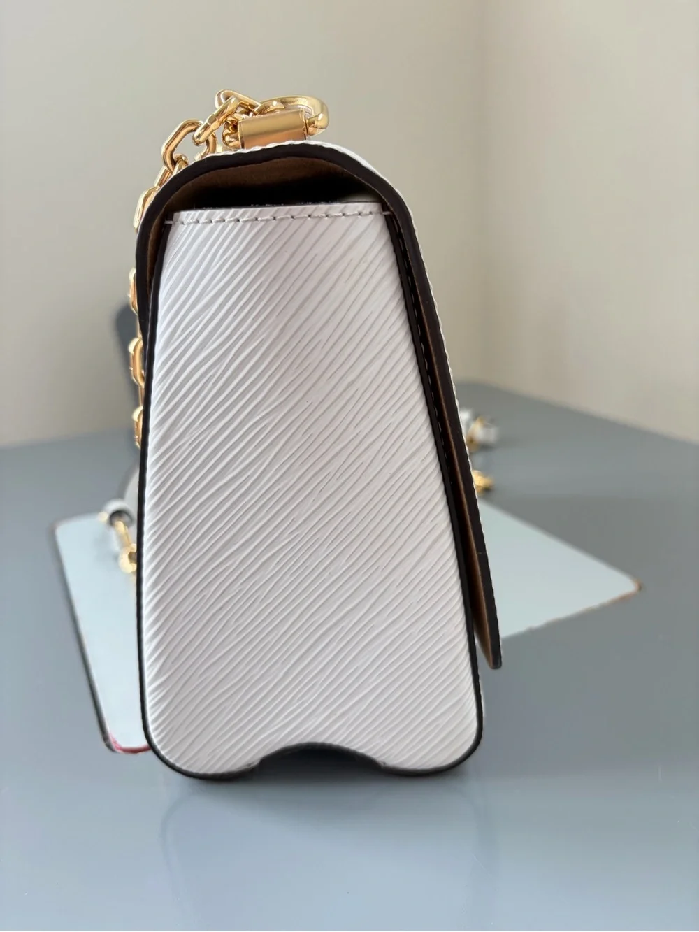 Louis Vuitton White Crossbody Bag with Gold Chain and LV Logo